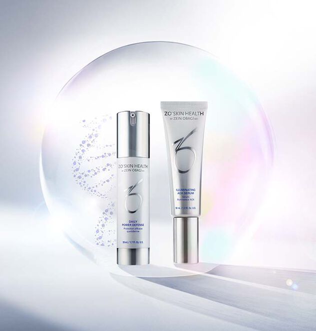 Daily Power Defense and Illuminating AOX Serum against an irridescent bubble