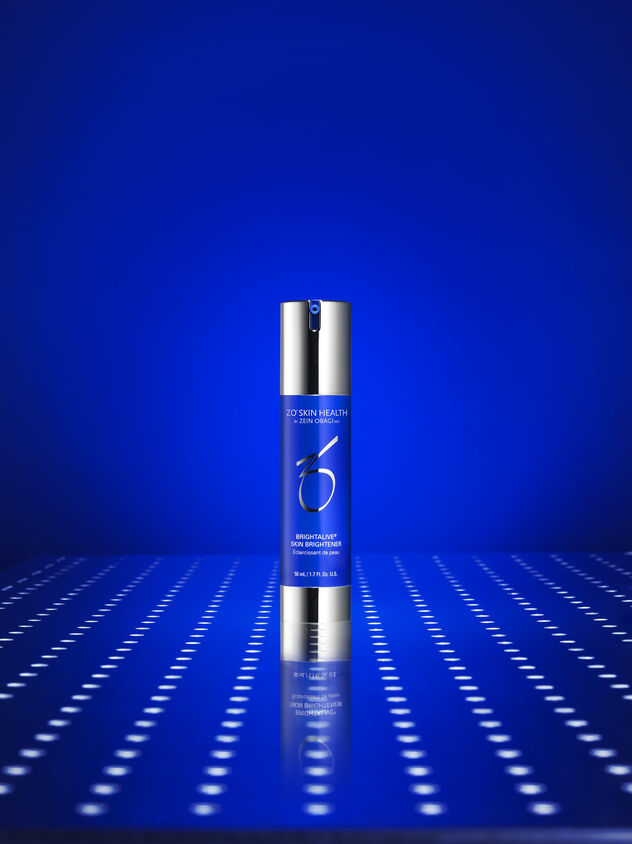 Brightalive® Skin Brightener on a blue background
