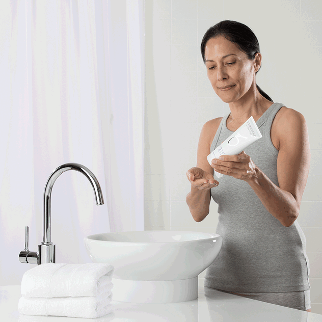 gif of woman washing her face