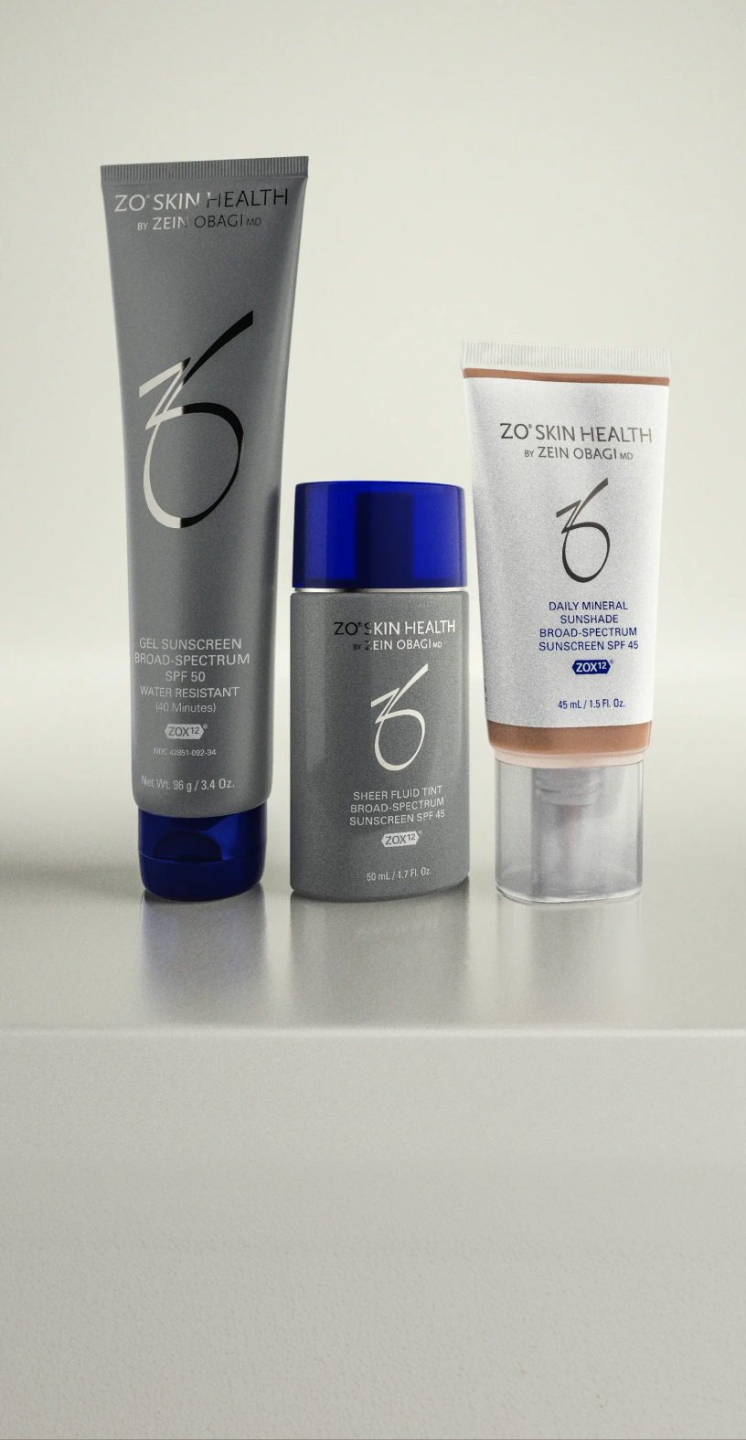 ZO Skin Health sunscreen products including Gel Sunscreen SPF 50, Sheer Fluid Tint SPF 45, and Daily Mineral Sunshade SPF 45 displayed side by side on a neutral background.