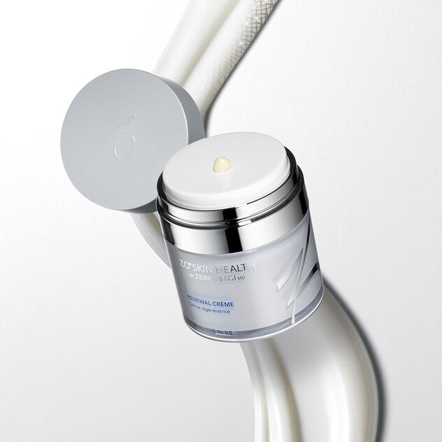 Renewal Cr&egrave;me against a cream swatch