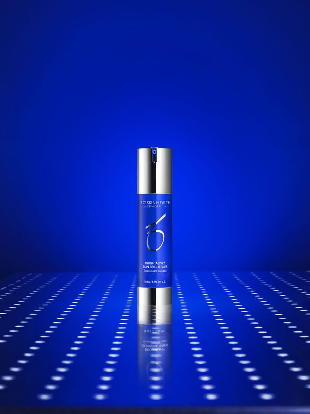 Brightalive&reg; Skin Brightener on a blue background